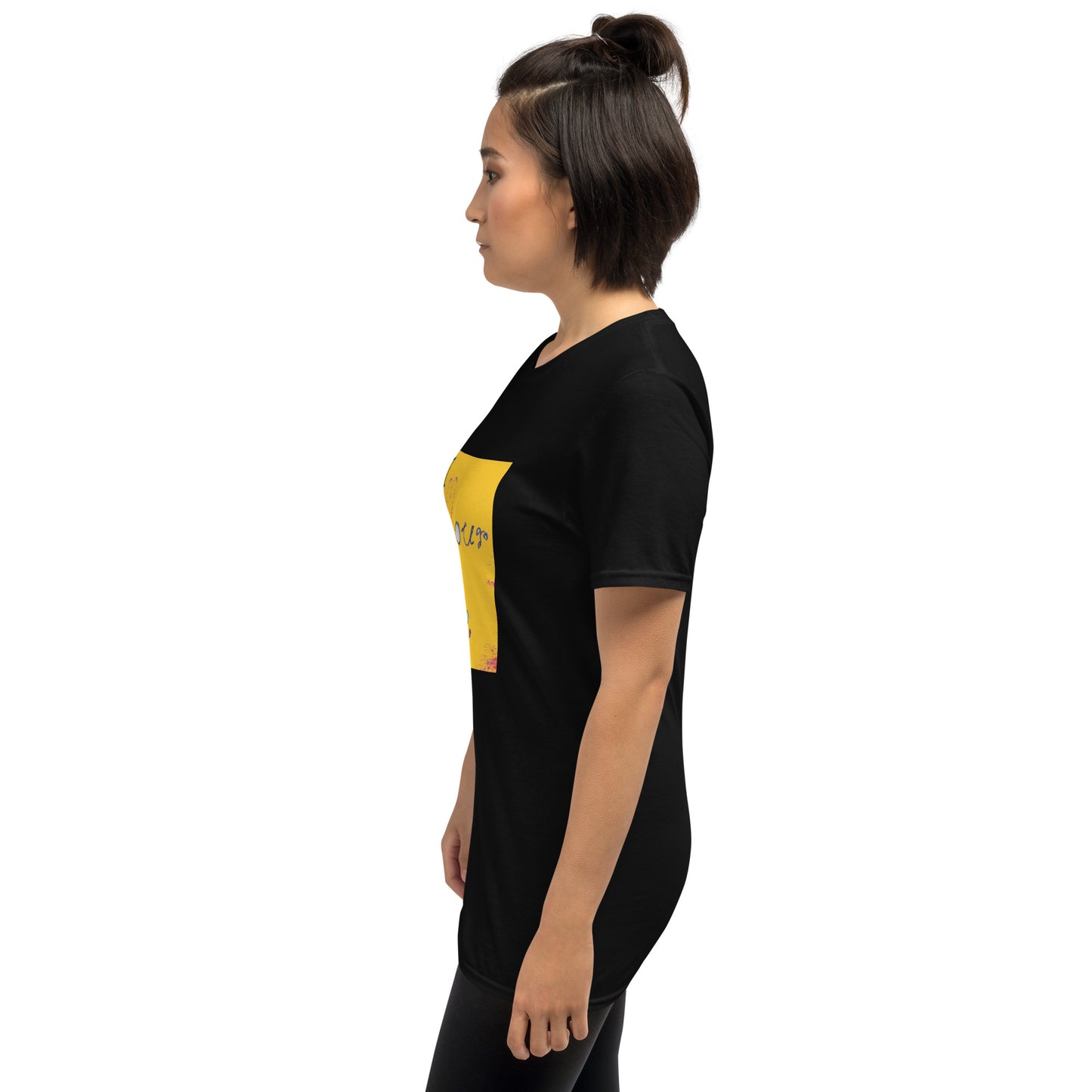 a woman standing in front of a wall