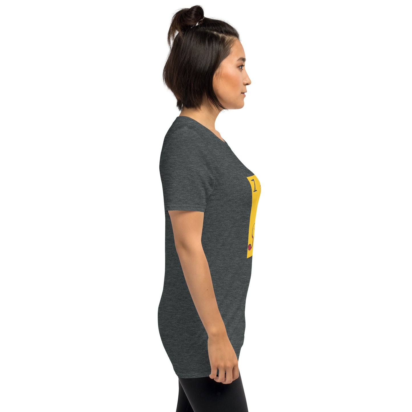 a woman standing in front of a wall