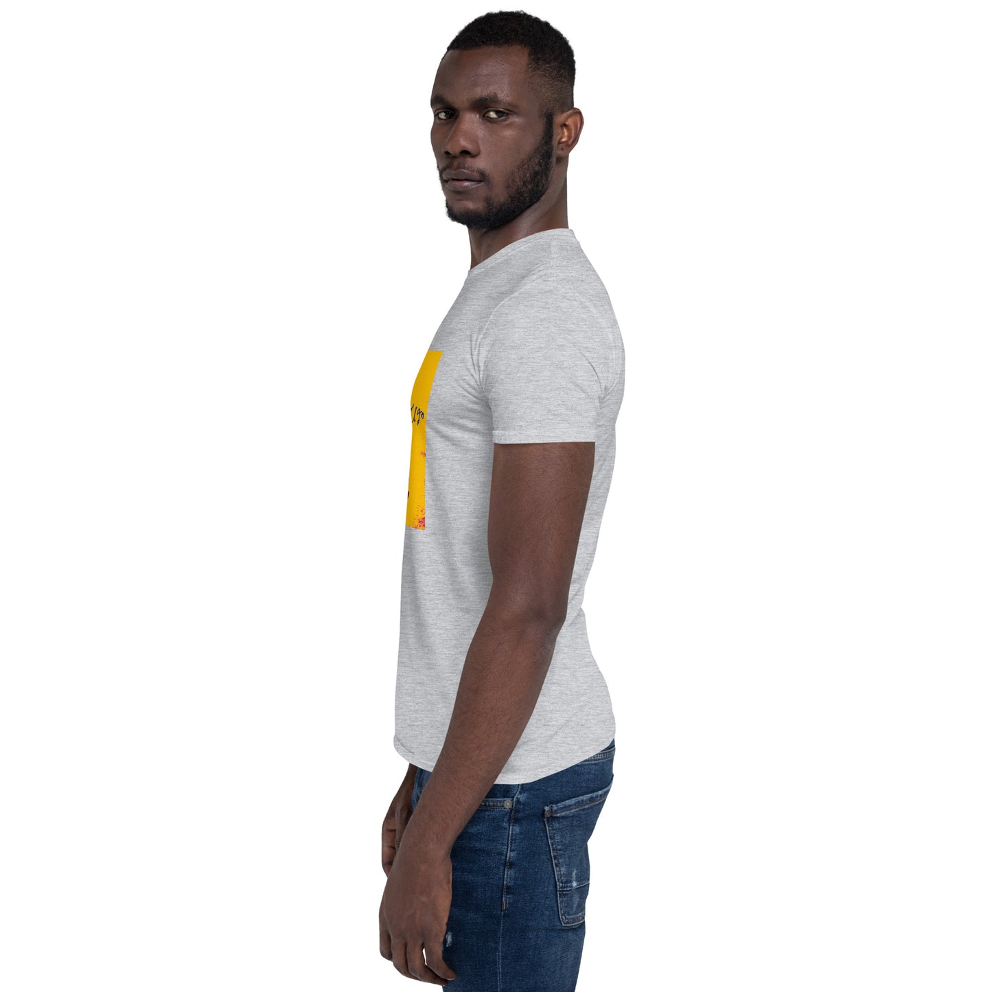 a man standing next to a wall with a skateboard