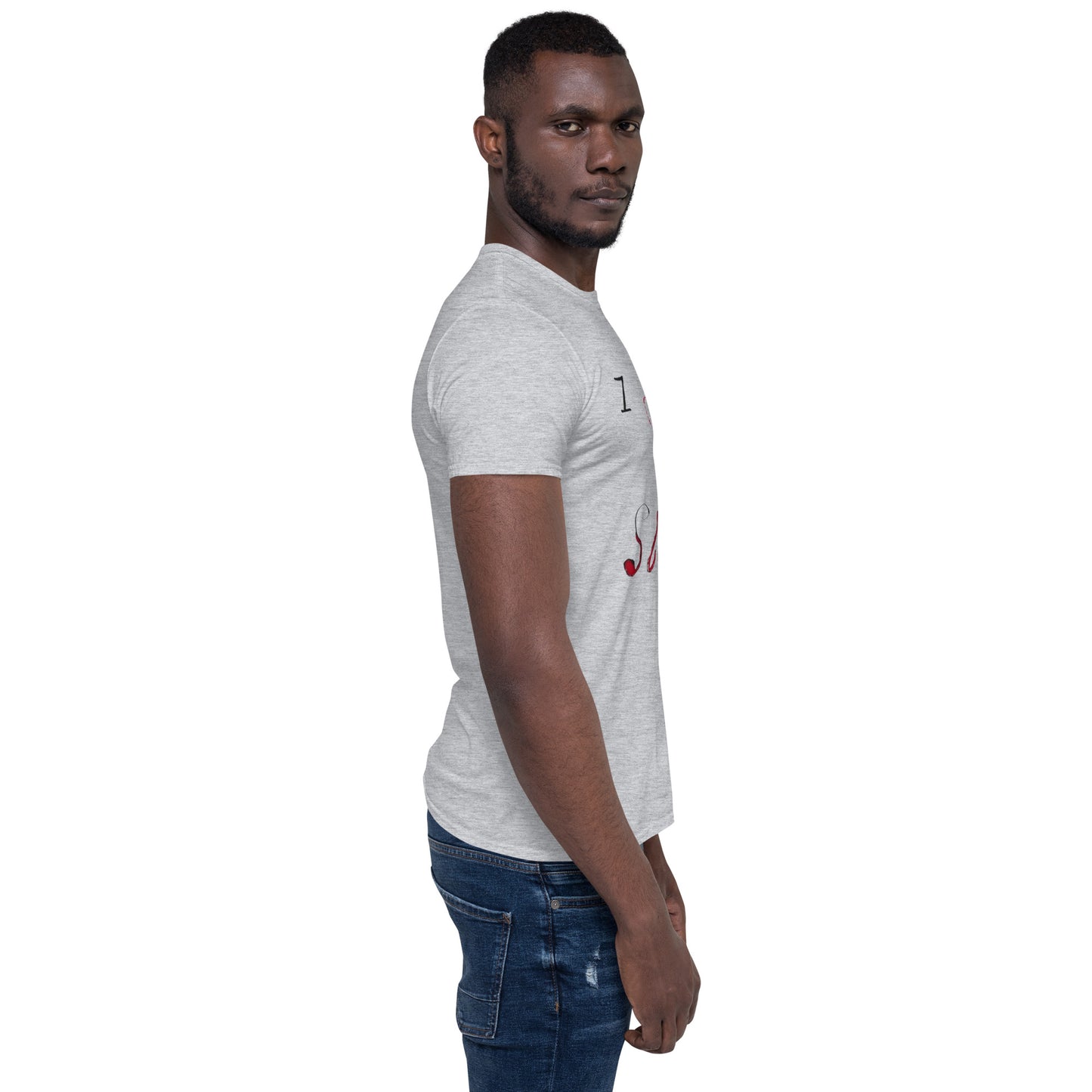 a man standing next to a wall with a skateboard
