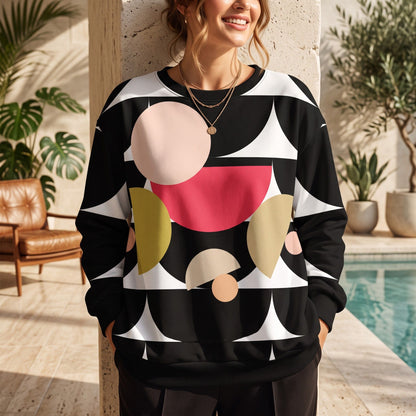 Good Wishes 365 black recycled sweatshirt with geometric mushroom graphic print worn by a woman by a pool
