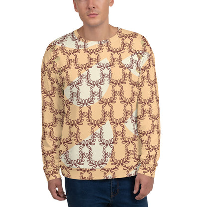 A man wearing a beige unisex sweatshirt with an all-over print of laurel leaves and crown frangipani.