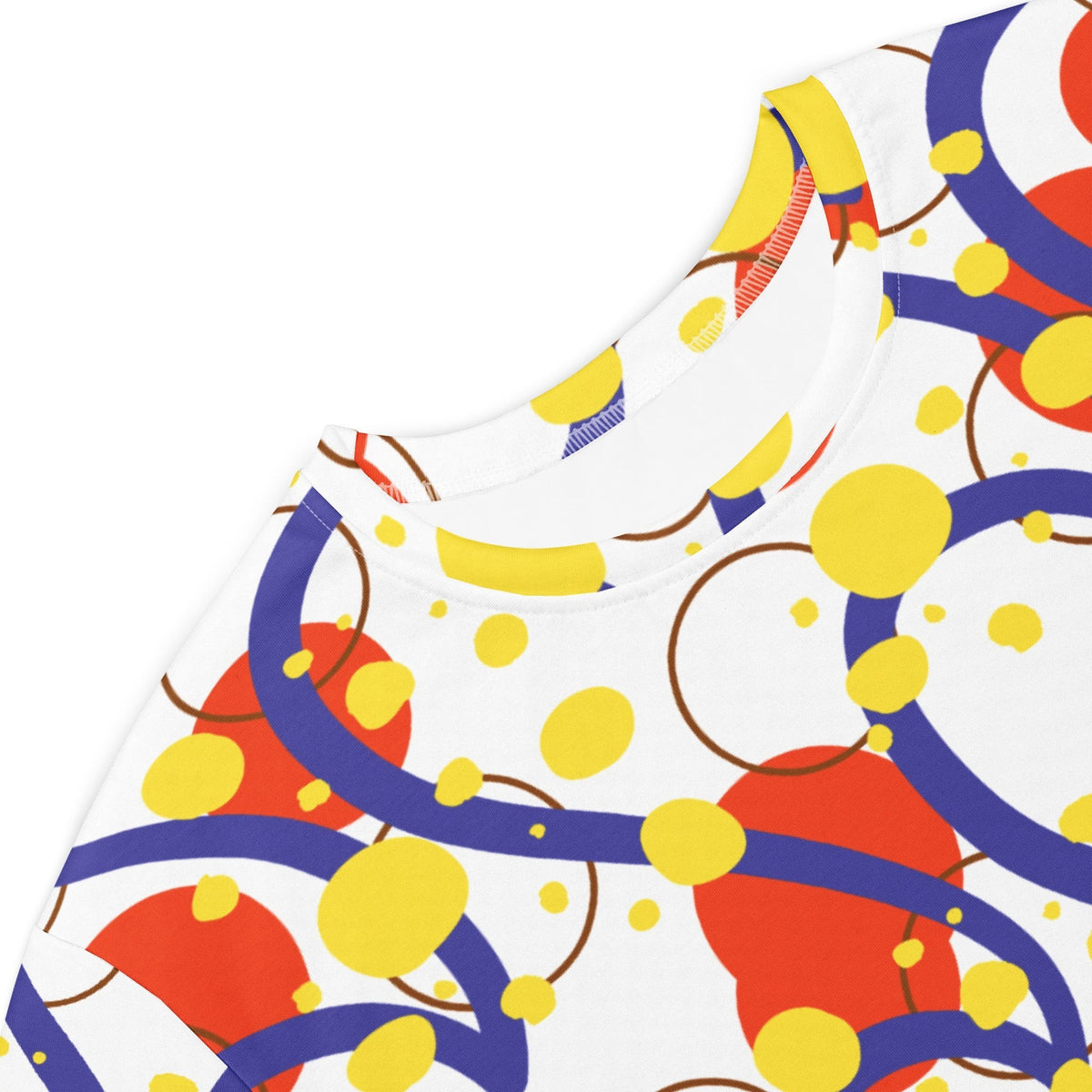 Good Wishes 365 abstract print t-shirt dress with vibrant red, yellow, and blue circles on a white stretch fabric.