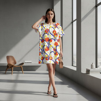 Good Wishes 365 white t-shirt dress with abstract blue, red, and yellow circle pattern. Comfortable oversize fit.