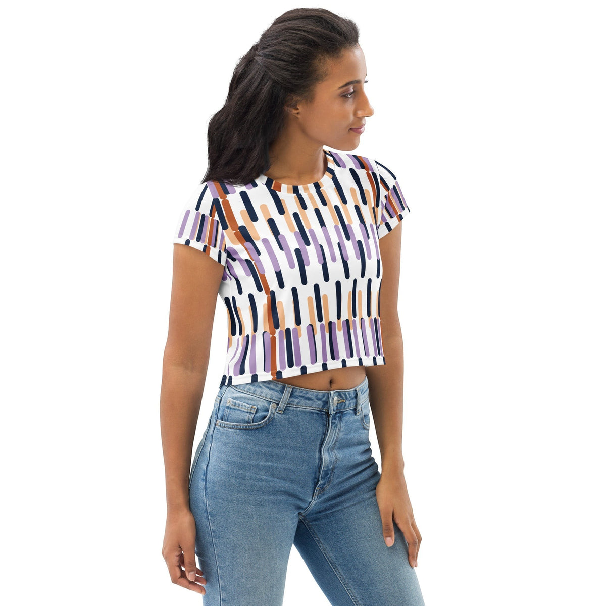 Good Wishes 365 model wearing a white crop tee with a colorful vertical stripe pattern and four-way stretch fabric.