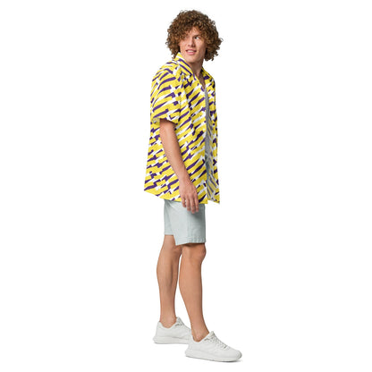 Good Wishes 365 short sleeve button down shirt with yellow and purple geometric print worn by a curly-haired man. All-over print, unisex button shirt, side view. 