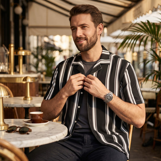 Good Wishes 365 men's short sleeve button-up shirt with black and white vertical stripes and a relaxed camp collar.