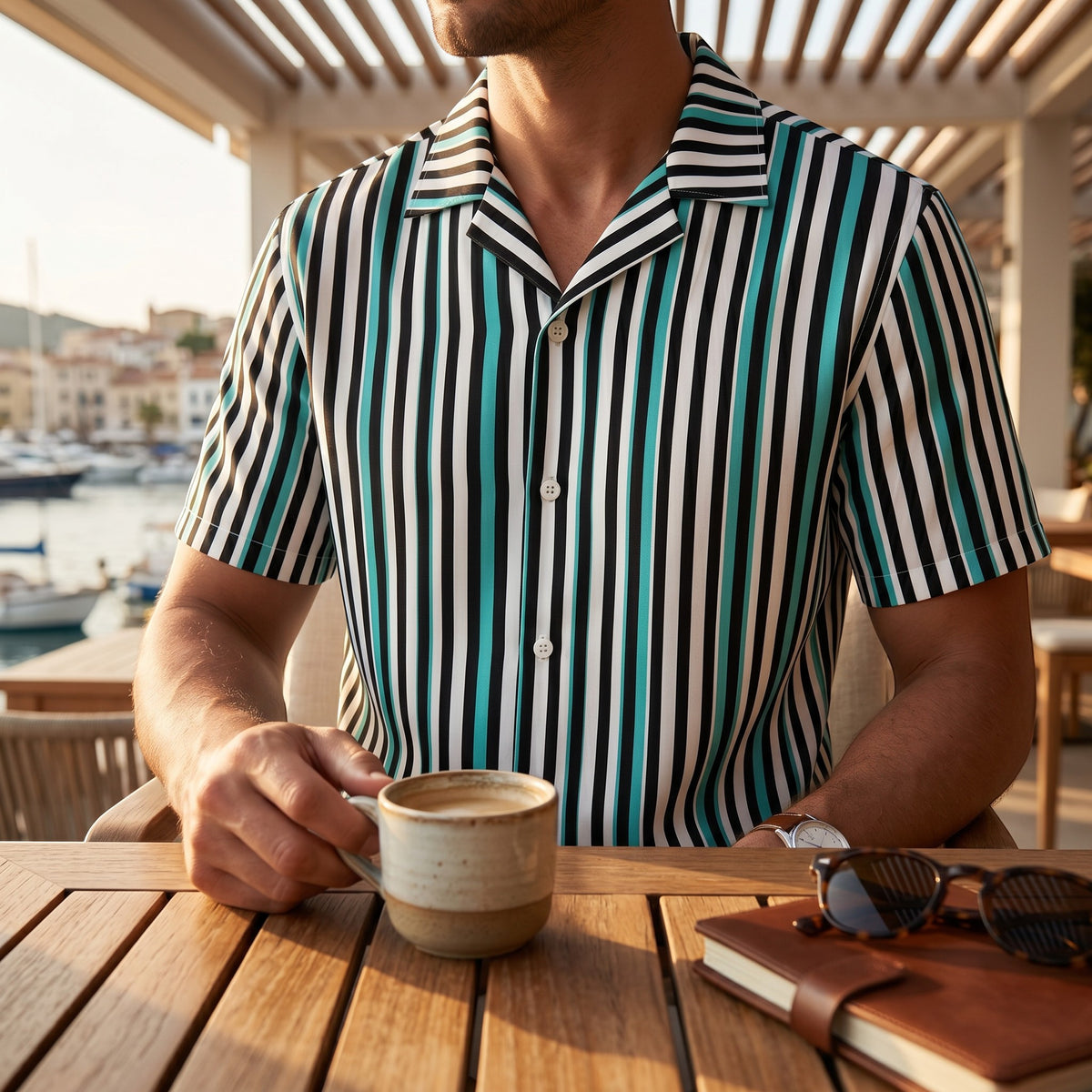 Good Wishes 365 men's short sleeve button-up shirt with teal, black, and white vertical stripes and a camp collar.