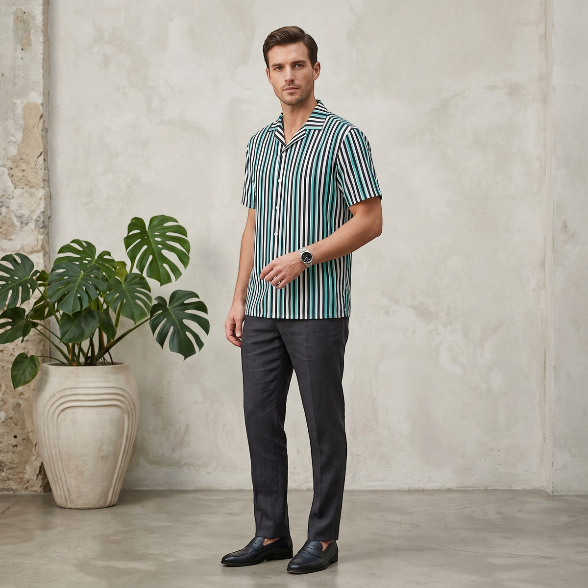 Good Wishes 365 men's teal, black, and white vertical striped short sleeve button-up shirt with a camp collar.