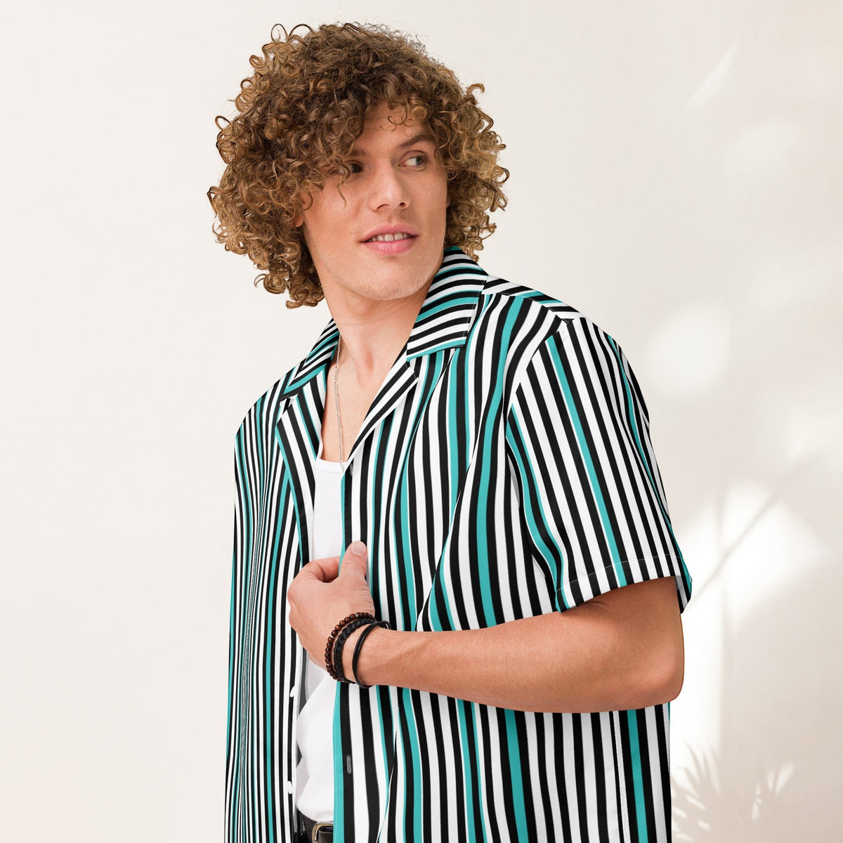 Good Wishes 365 men's teal, black, and white striped short sleeve button-up shirt with UPF50+ protection, All-over print, unisex button shirt, close side view.