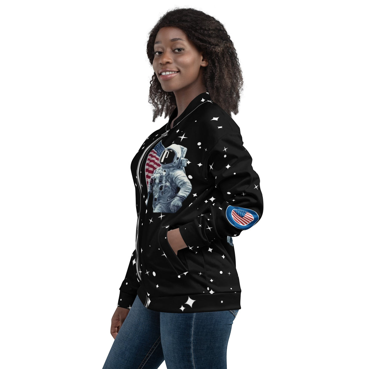 Good Wishes 365 unisex bomber jacket with a black space print featuring an astronaut and stars, worn by a woman.