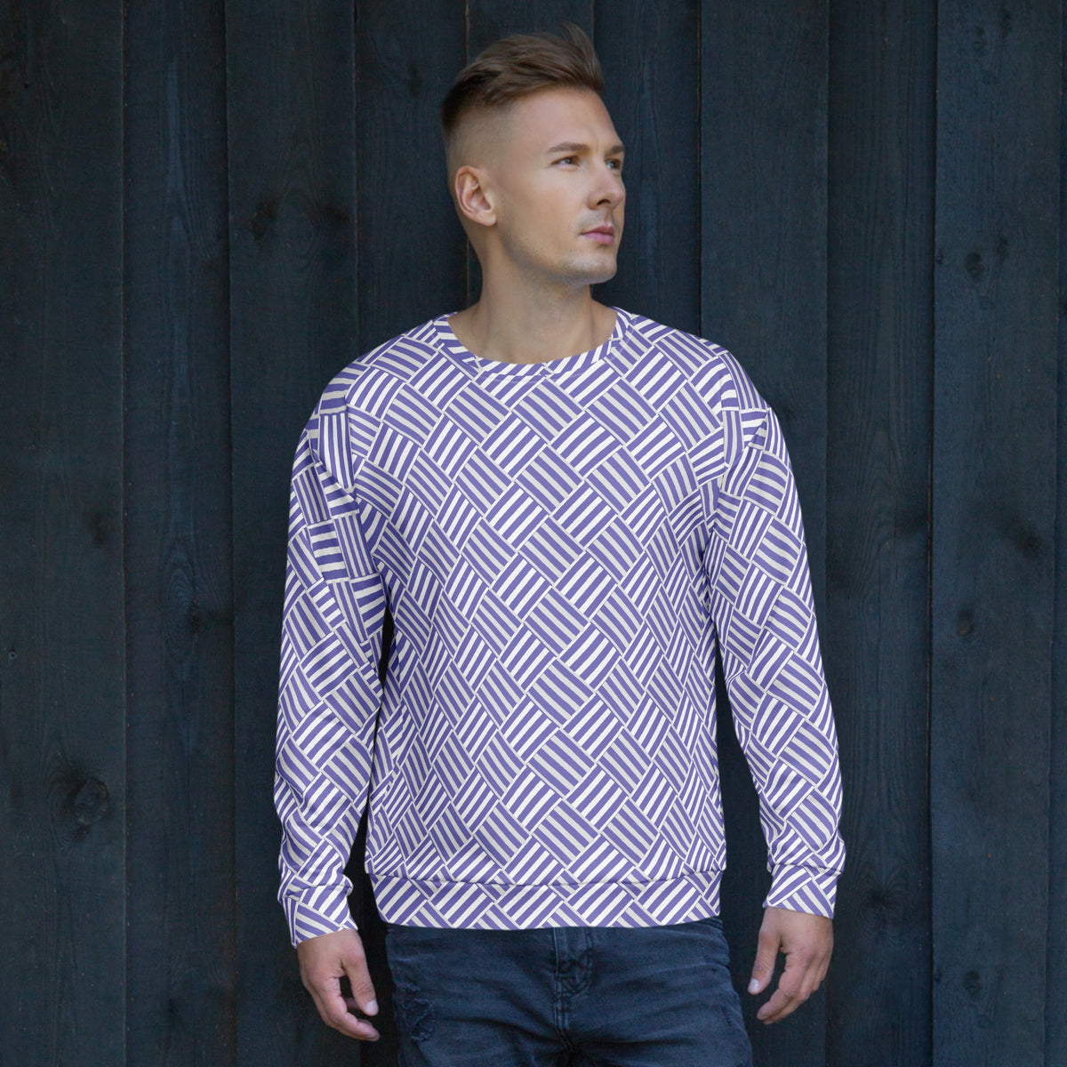 A man wearing a Good Wishes 365 recycled unisex sweatshirt with a violet and white basketweave geometric print.