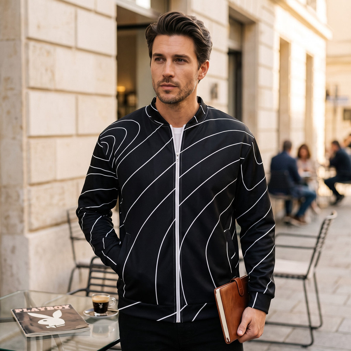 Good Wishes 365 black bomber jacket with white wave line print, featuring a silver zipper and brushed fleece interior.