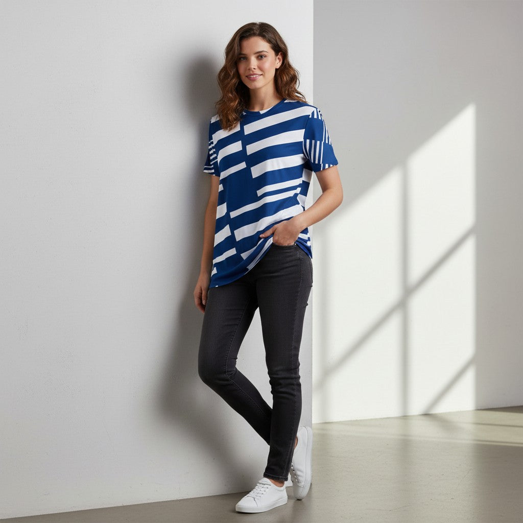 Good Wishes 365 blue and white abstract stripe t-shirt dress made from polyester and spandex with an oversized fit.