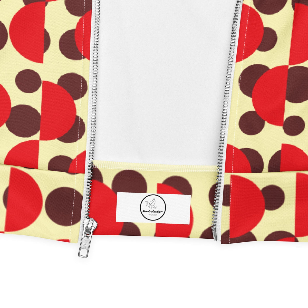 Good Wishes 365 bomber jacket featuring a cream background with brown polka dots and red semi-circle geometric print.