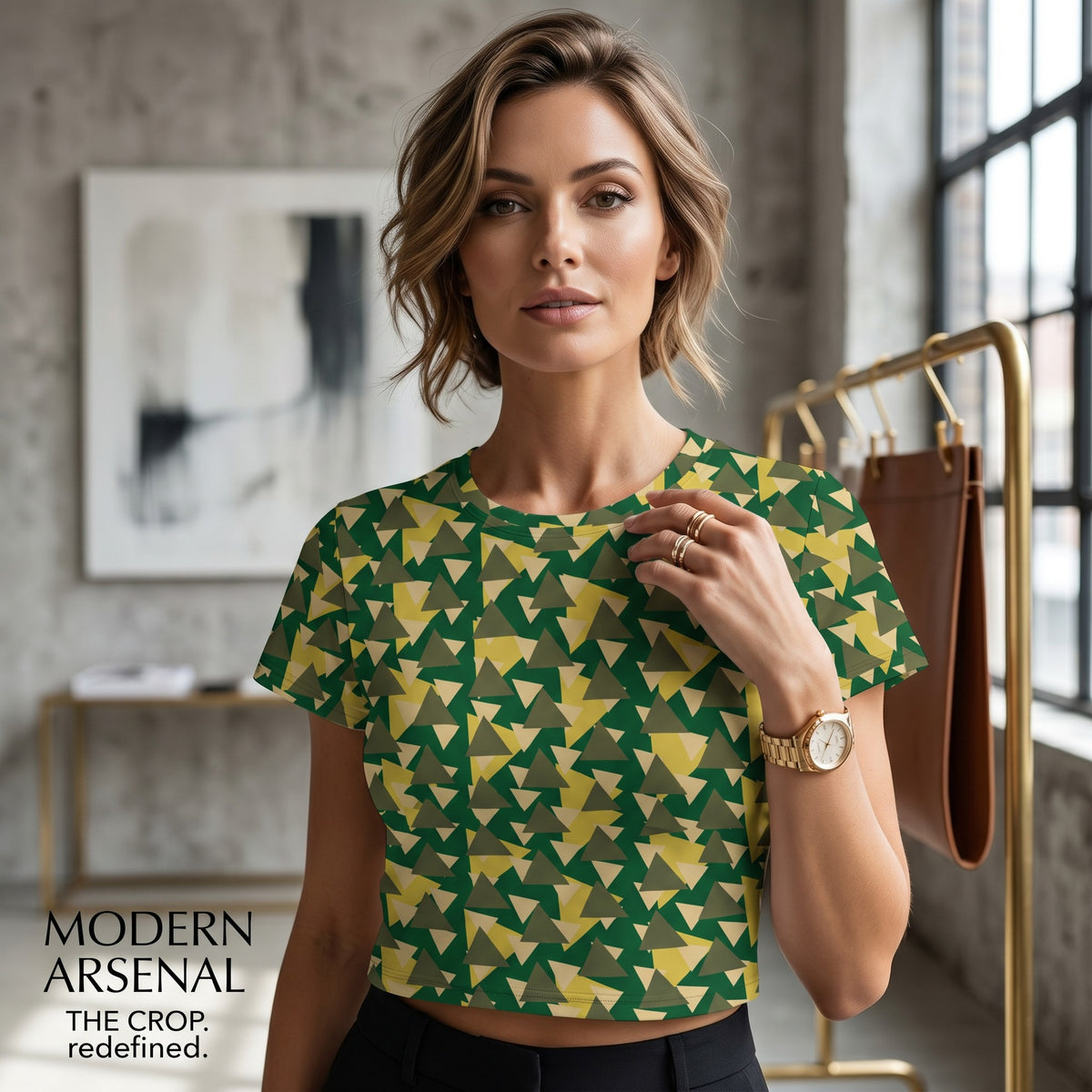 Good Wishes 365 camouflage print crop tee with geometric triangle pattern worn by a woman in a modern studio setting.