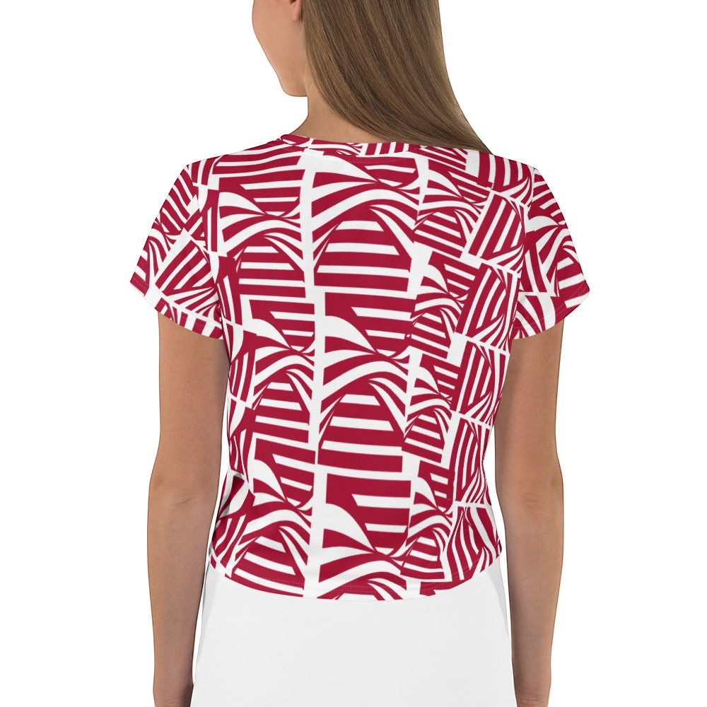 Back view of a woman wearing a Good Wishes 365 carmine red and white abstract patterned crop tee in stretchy jersey.