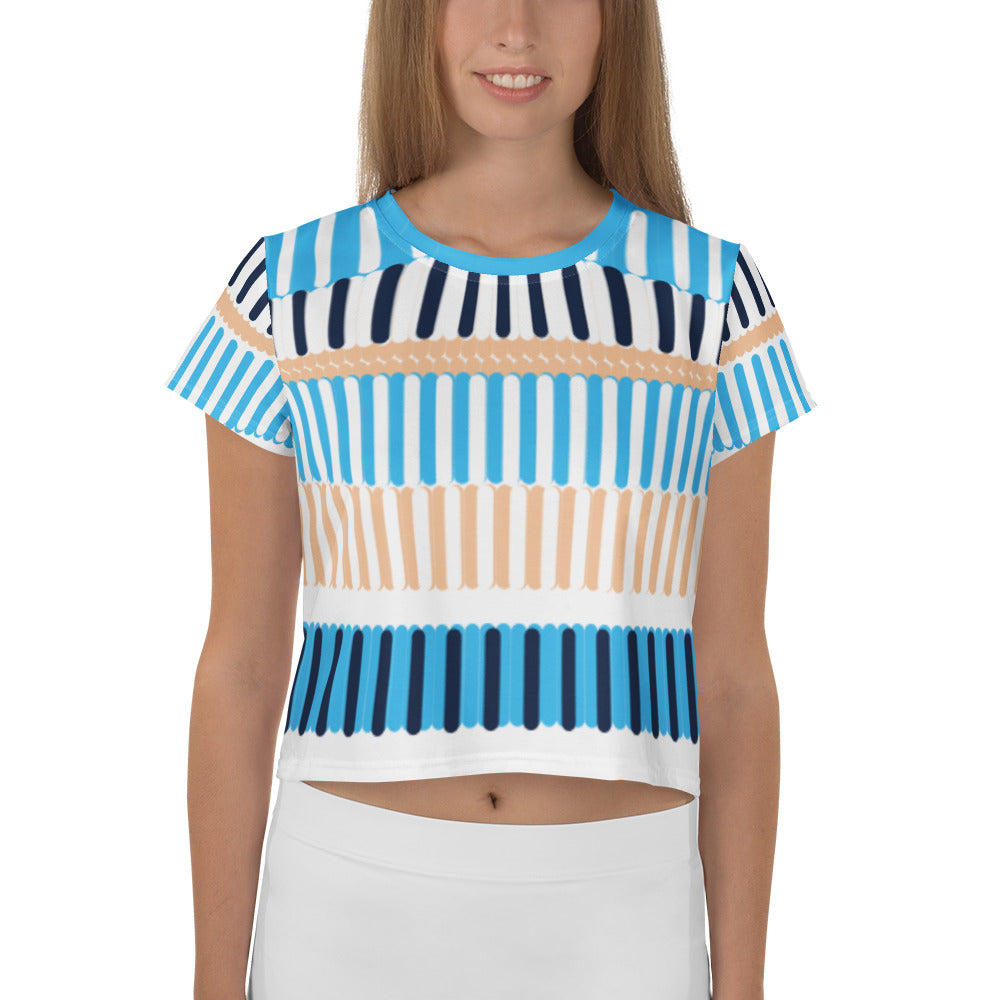 Good Wishes 365 crop tee featuring a blue, navy, and sand coastal-inspired vertical stripe all-over print