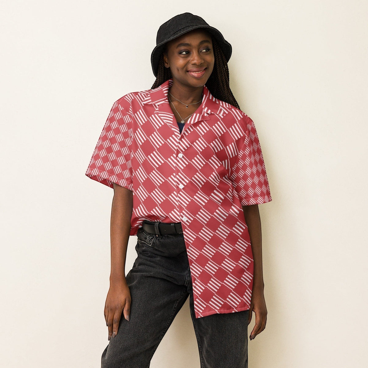 Model wearing a Good Wishes 365 coral-pink short sleeve button-down shirt with a white geometric striped pattern.