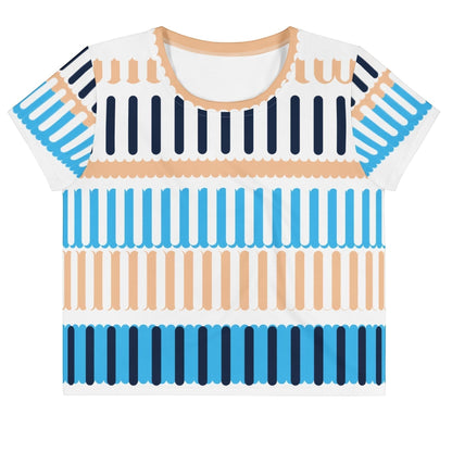 Good Wishes 365 crop tee featuring a Coastal Rhythm III all-over print with blue, navy, and peach geometric stripes.