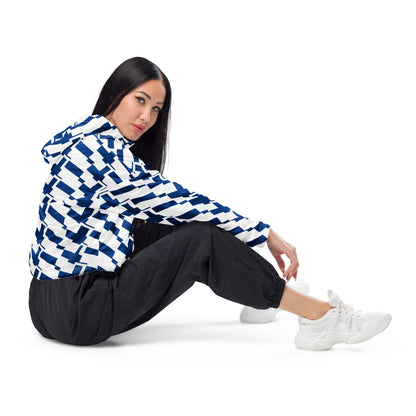 Good Wishes 365 women's cropped windbreaker with blue and white Finnish flag print, worn with black joggers.