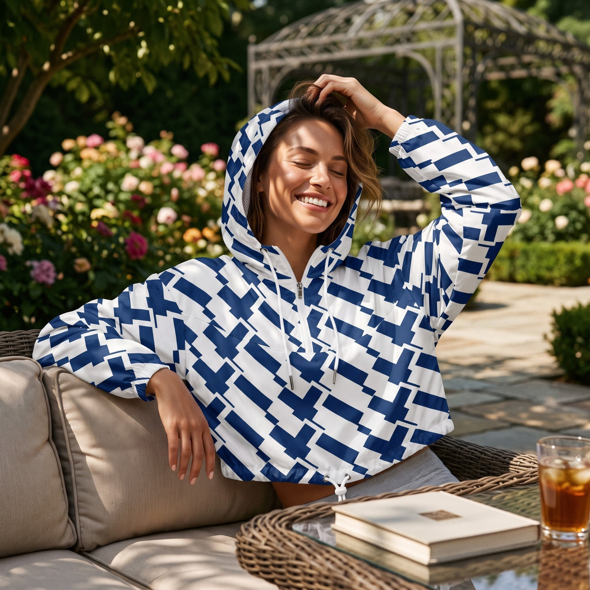 Good Wishes 365 women's cropped windbreaker with blue and white Finnish flag print, featuring a hood and half-zip front.