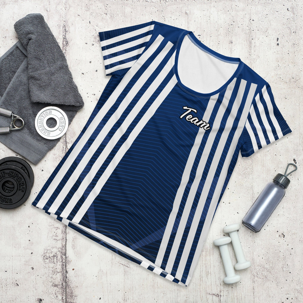 Good Wishes 365 dark cerulean athletic t-shirt with white vertical stripes and Team graphic on a gym floor background