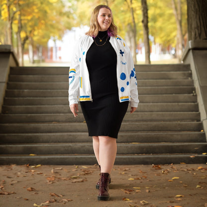Good Wishes 365 white bomber jacket with blue and yellow Finnish flag motifs worn by a woman over a black dress