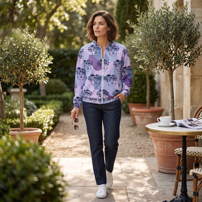 Good Wishes 365 unisex bomber jacket with purple floral boy print, worn by a woman in a garden setting.