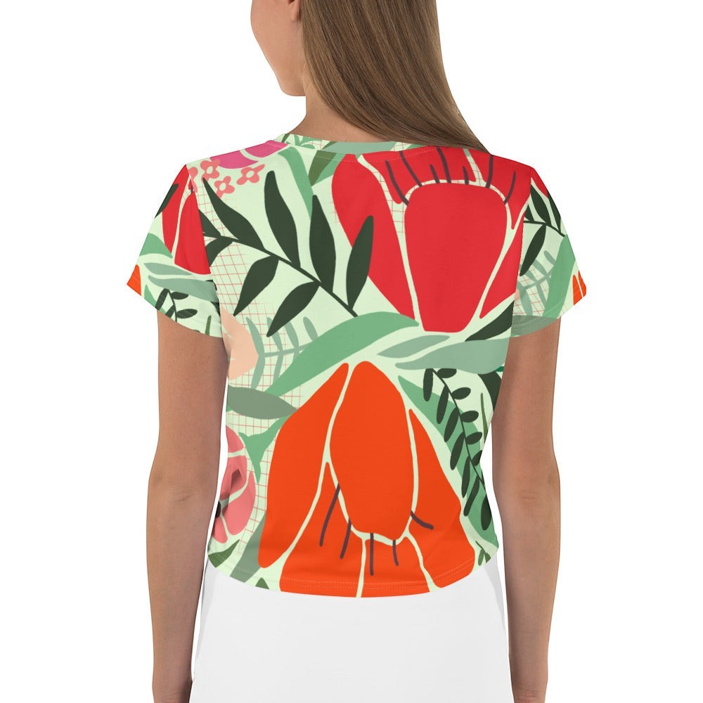 Good Wishes 365 women's crop tee featuring a mint green background with red and orange floral patterns, back view.