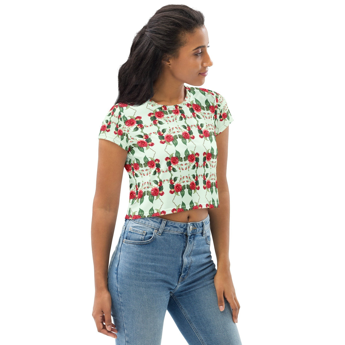 Good Wishes 365 mint green crop tee featuring a red rose pattern, worn by a model with blue jeans.