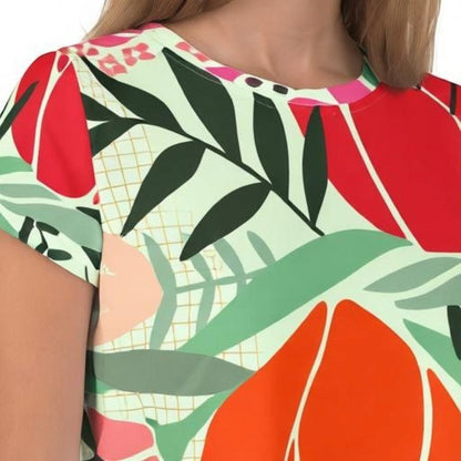 Good Wishes 365 mint green crop tee with a vibrant red and orange floral and leaf pattern in stretchy jersey fabric.