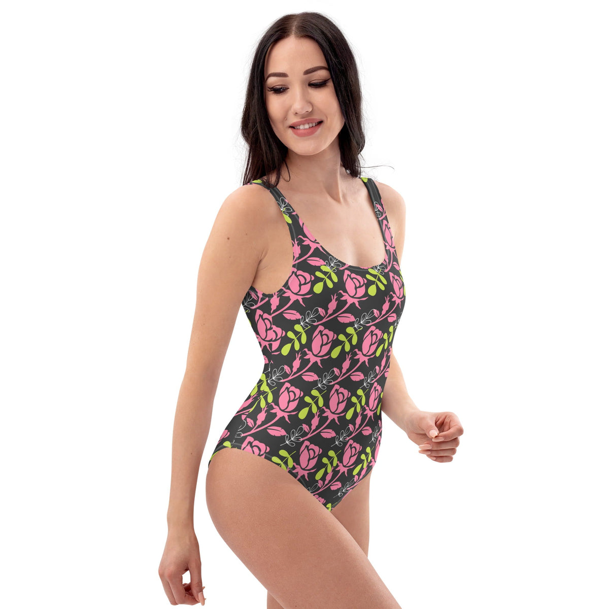Good Wishes 365 one-piece swimsuit featuring a dark background with a vibrant pink rose and green leaf floral print.