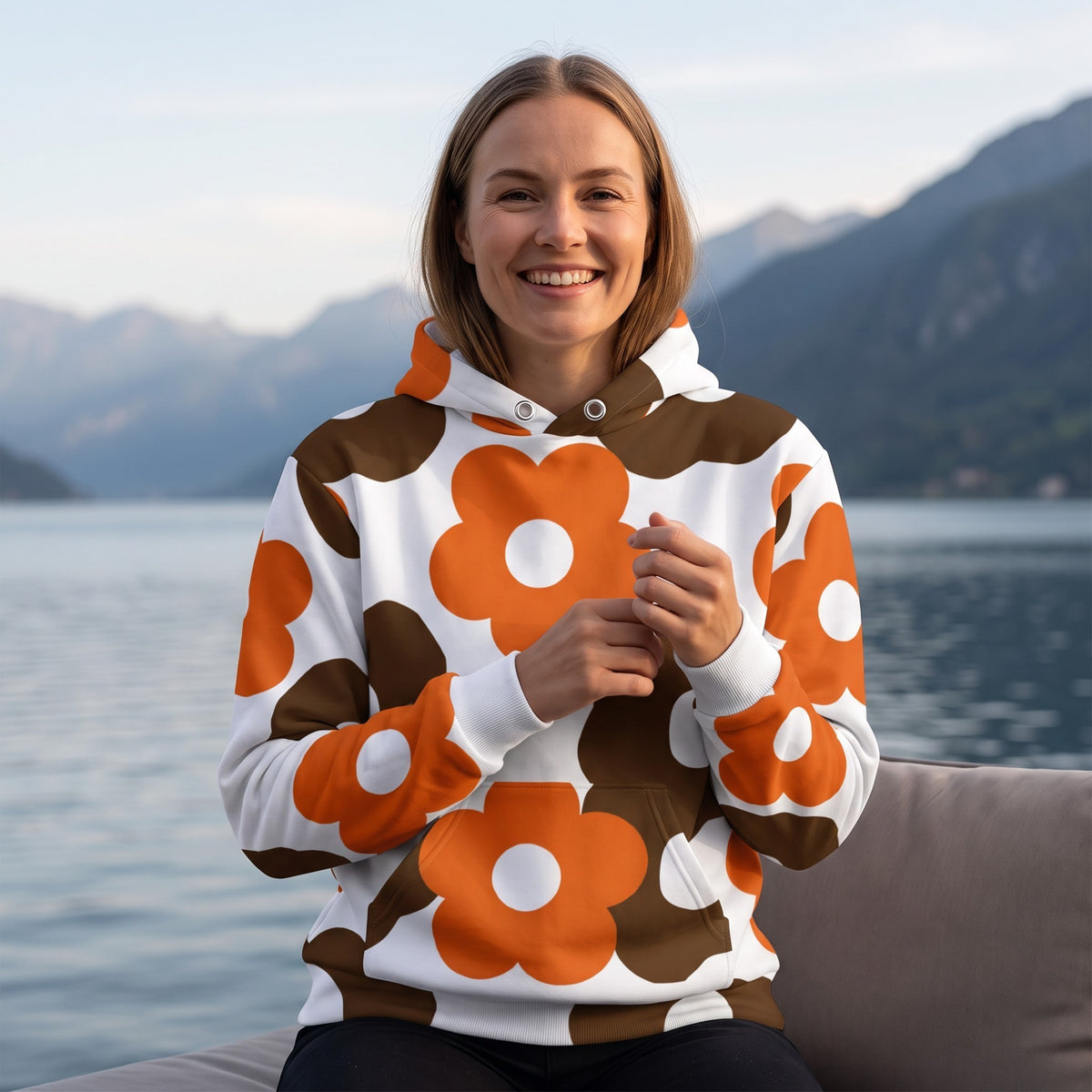 Good Wishes 365 recycled hoodie with a retro brown and orange floral print, featuring a drawstring hood and pocket.