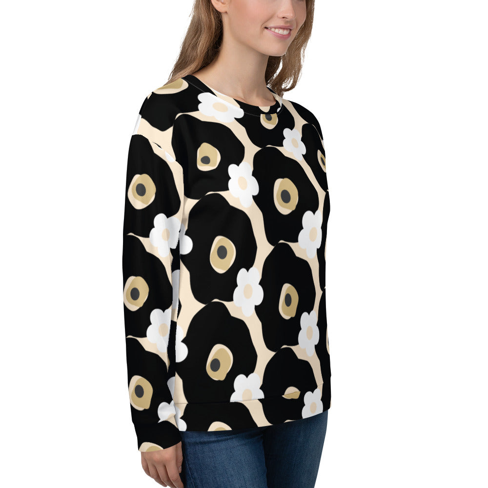 Good Wishes 365 recycled sweatshirt featuring an all-over black, white, and beige floral print on a woman