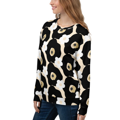 Good Wishes 365 recycled sweatshirt with black, white, and beige floral print worn by a woman in a side profile view.