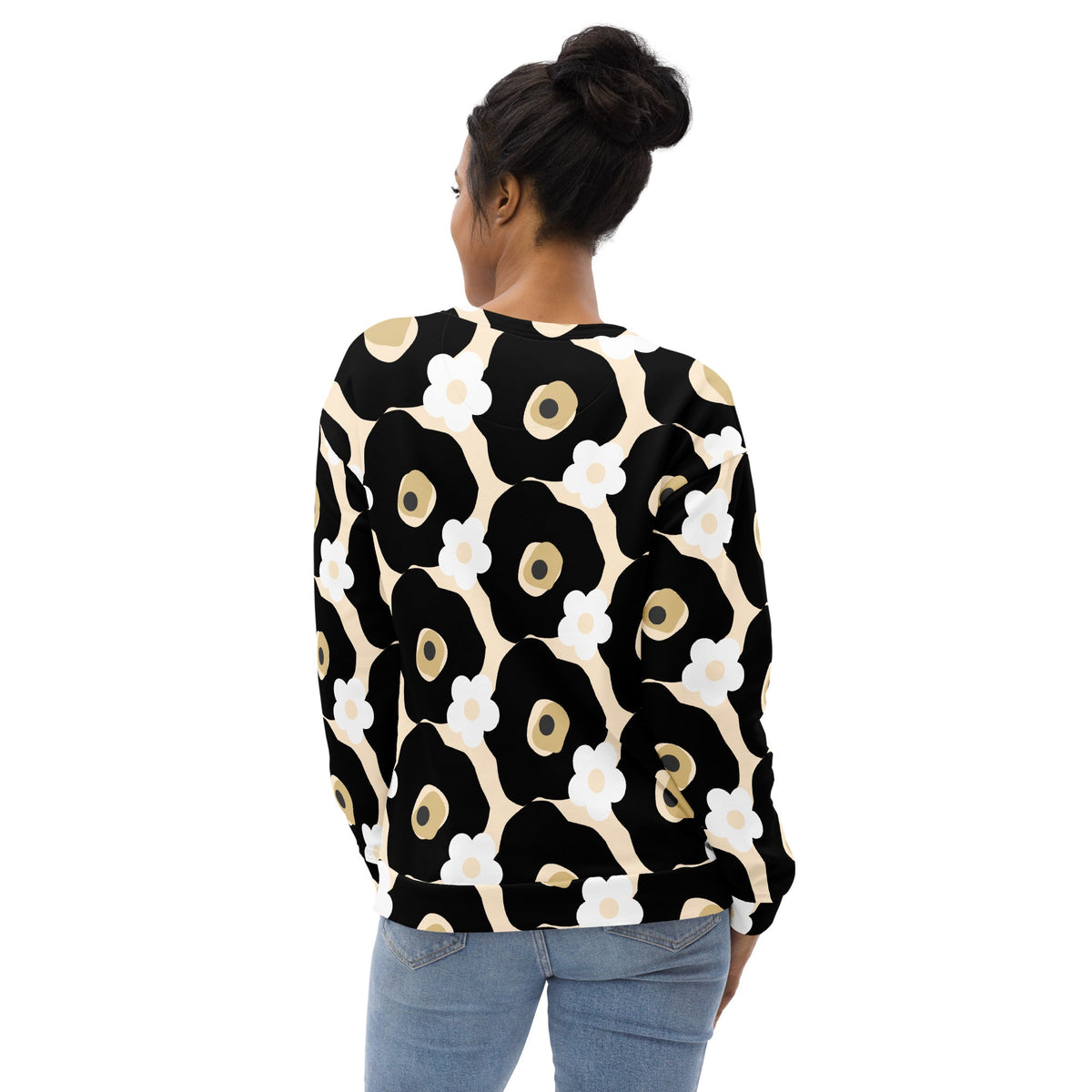 Good Wishes 365 recycled sweatshirt with black, white, and beige floral print worn by a woman, back view