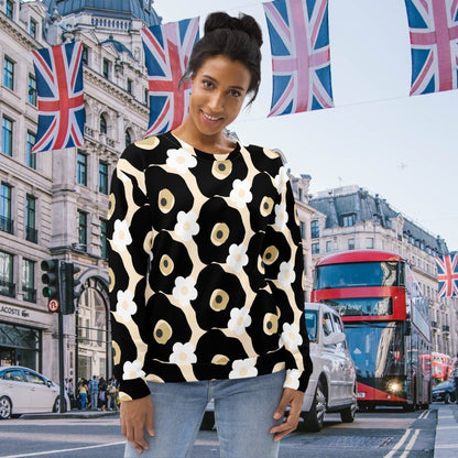 Good Wishes 365 recycled sweatshirt featuring a black, white, and beige floral print worn by a woman in London.