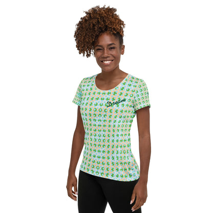 Good Wishes 365 women's athletic t-shirt with a green and blue geometric pattern and Dream embroidery on the chest.