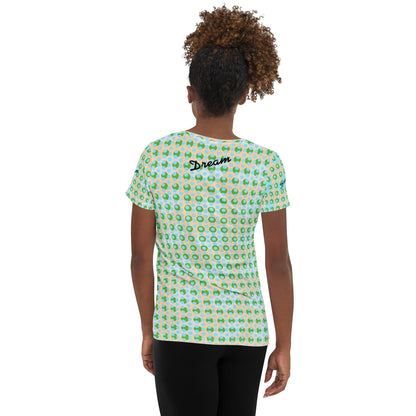 Good Wishes 365 women's athletic t-shirt with green and blue geometric pattern, worn by a model from the back view.