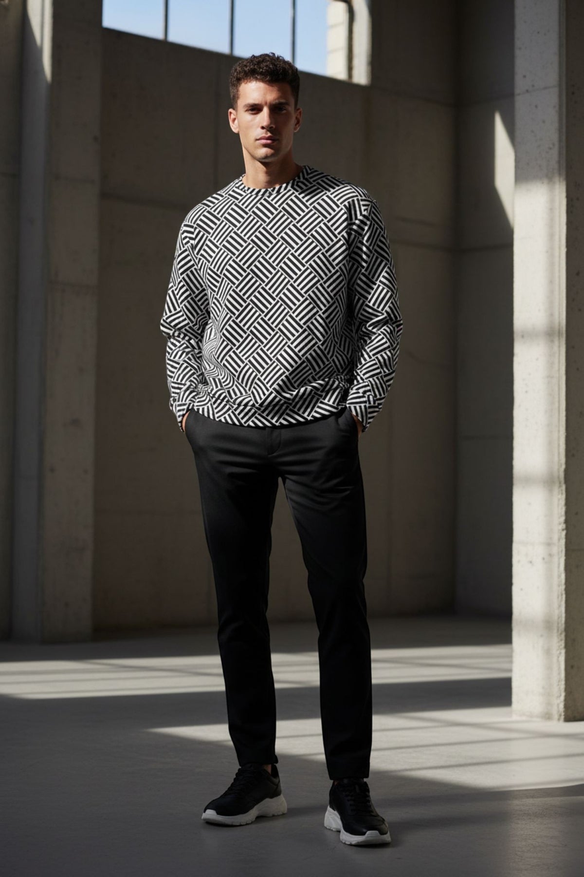 Good Wishes 365 unisex crewneck sweatshirt featuring a black and white geometric basketweave pattern on a male model