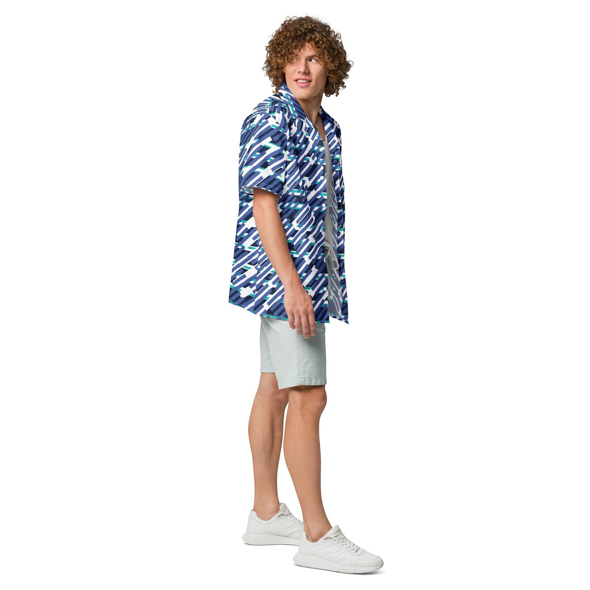 Good Wishes 365 men's short sleeve button down shirt in mariner blue with a geometric pattern, worn with light shorts.