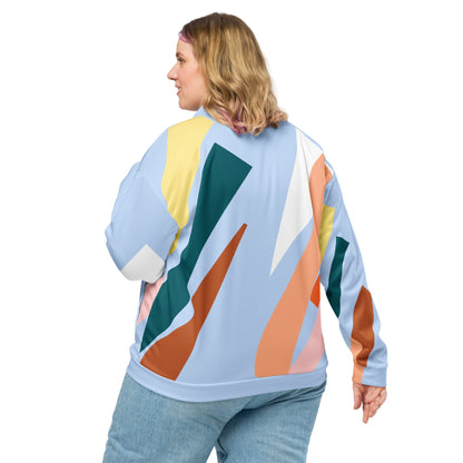 Good Wishes 365 women's bomber jacket with pastel blue and earth tone abstract geometric print, back view