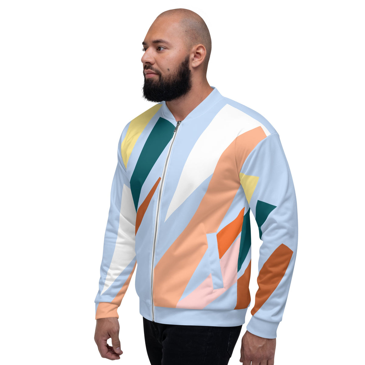 Good Wishes 365 unisex bomber jacket with abstract geometric print in pastel blue and earth tones on a male model.