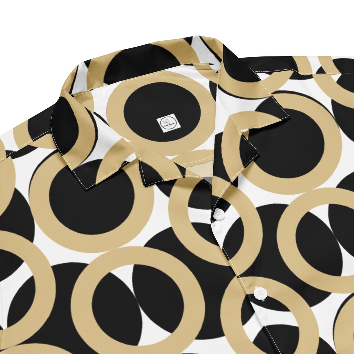 Good Wishes 365 unisex button shirt featuring a black, gold, and cream retro geometric circle pattern with a collar.