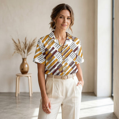 Good Wishes 365 unisex button shirt with a geometric pattern in yellow, brown, and grey, worn by a woman.