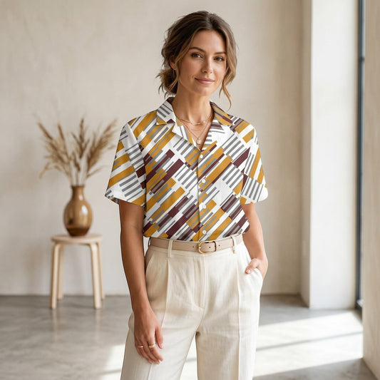 Good Wishes 365 unisex button shirt with a geometric pattern in yellow, brown, and grey, worn by a woman.