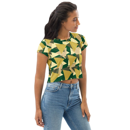 Good Wishes 365 geometric camo crop tee in forest green and tan worn by a woman with high-waisted jeans