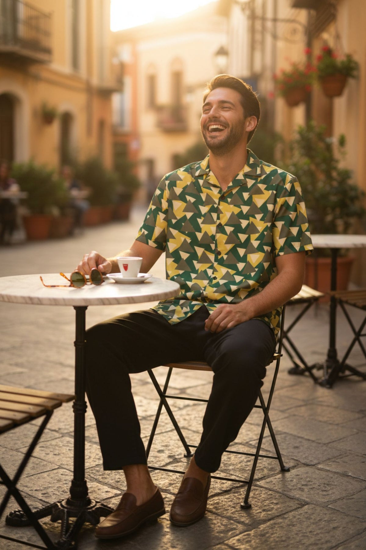 Good Wishes 365 Men's short sleeve button-down shirt with geometric camo print in green, yellow, and grey. Recycled polyester blend.