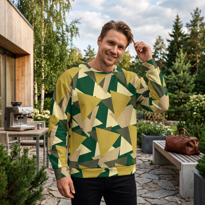 Good Wishes 365 men's recycled sweatshirt with a modern geometric camo print in green, olive, and beige outdoors.